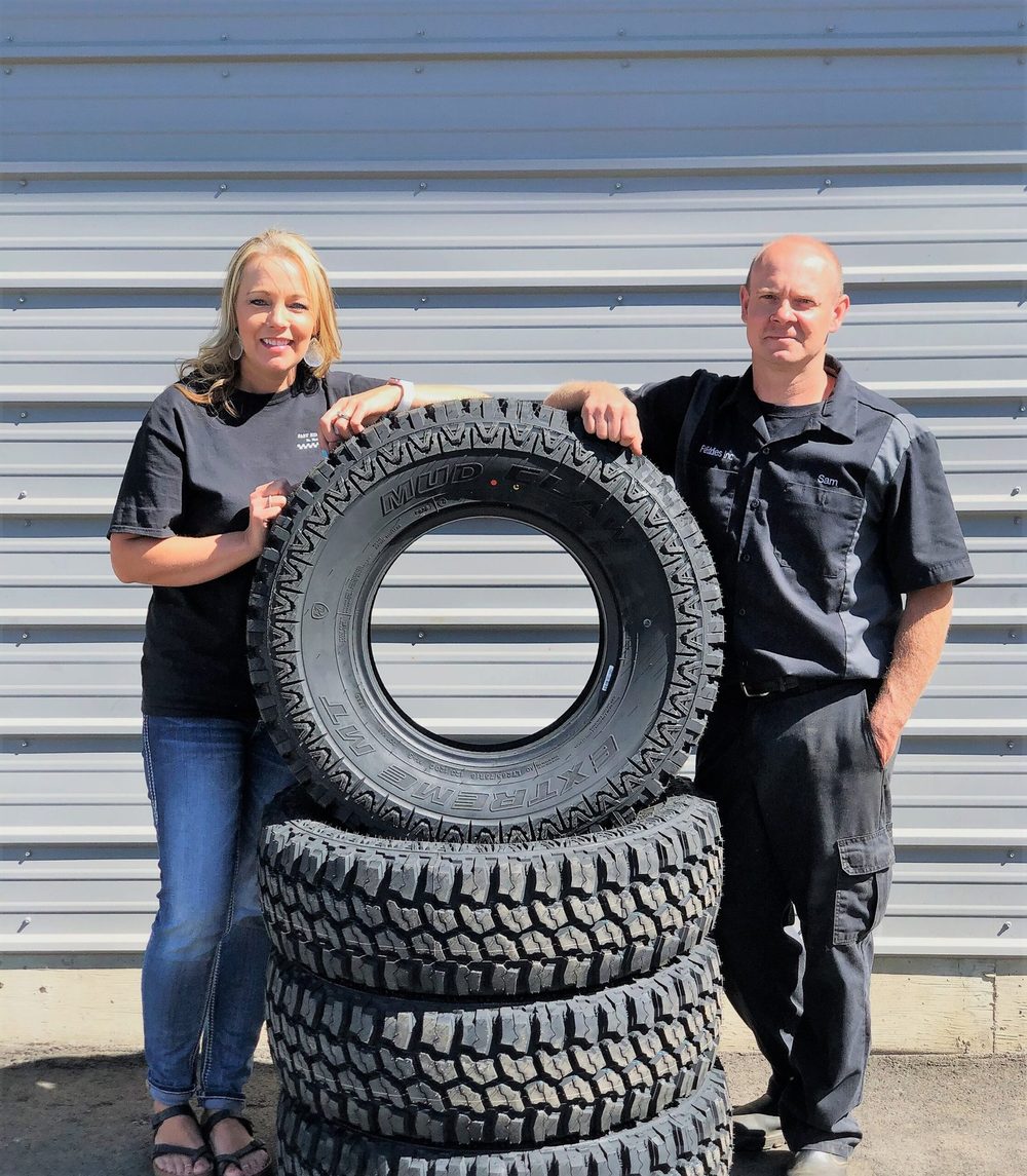 Fast Eddie's with a stack of new tires